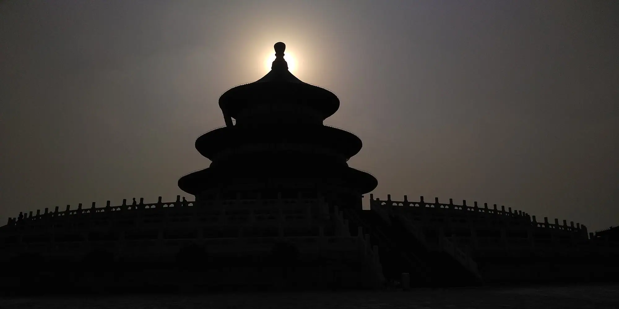 Silhouette of the Temple of Heaven in Beijing against the setting sun
