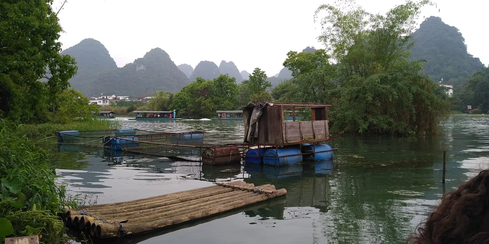 A bamboo raft on the river below the karst hills near Yangshuo